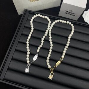 Vivienne Westwood Two-piece set of Saturn pearl necklaces (gold + silver)